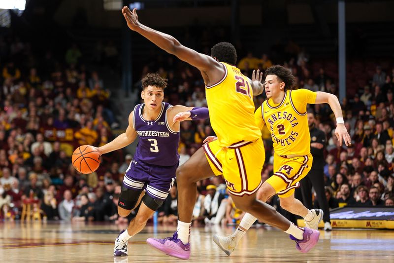 Feb 3, 2024; Minneapolis, Minnesota, USA; Northwestern Wildcats guard Ty Berry (3) works around Minnesota Golden Gophers guard Mike Mitchell Jr. (2) and forward Pharrel Payne (21) during the second half at Williams Arena. Mandatory Credit: Matt Krohn-USA TODAY Sports