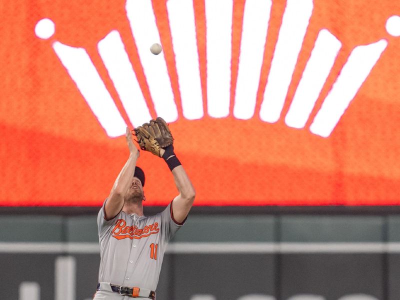 Sep 27, 2024; Minneapolis, Minnesota, USA; Baltimore Orioles second baseman Jordan Westburg (11) catches a fly ball hit by Minnesota Twins catcher Christian Vazquez (8) to end the fifth inning at Target Field. Mandatory Credit: Matt Blewett-Imagn Images