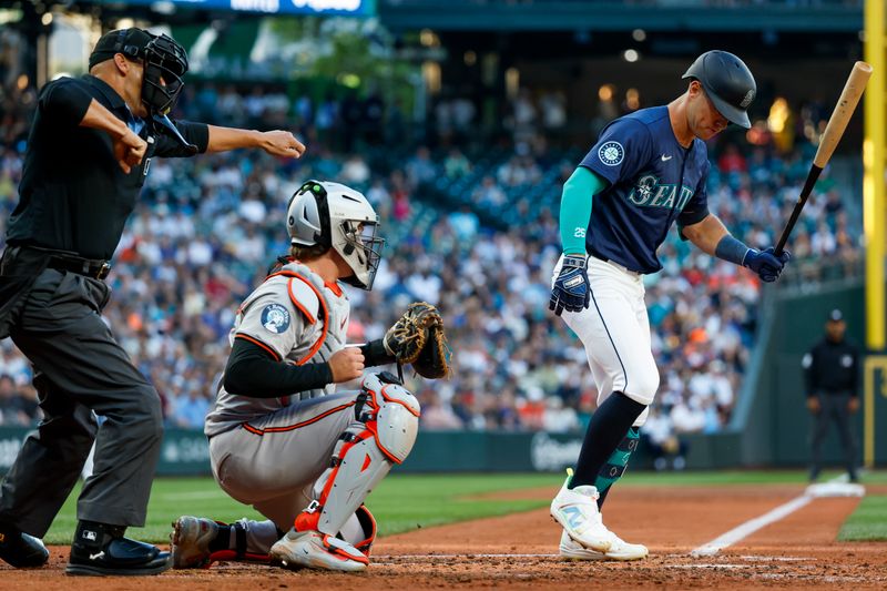 Jul 3, 2024; Seattle, Washington, USA; Seattle Mariners second baseman Dylan Moore (25) strikes out against the Baltimore Orioles during the third inning at T-Mobile Park. Mandatory Credit: Joe Nicholson-USA TODAY Sports