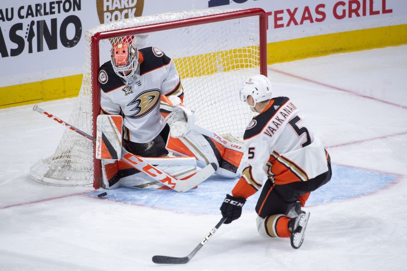 Feb 15, 2024; Ottawa, Ontario, CAN; Anaheim Ducks goalie Lukas Dostal (1) makes a save in the third period against the Ottawa Senators at the Canadian Tire Centre. Mandatory Credit: Marc DesRosiers-USA TODAY Sports