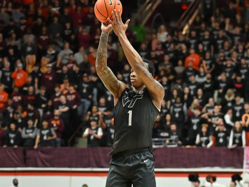 Jan 27, 2026; Blacksburg, Virginia, USA;  Virginia Tech Hokies forward Tobi Lawal (1) shoots a shot against the Georgia Tech Yellow Jackets during the second half at Cassell Coliseum. Mandatory Credit: Brian Bishop-Imagn Images