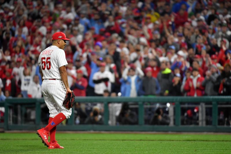 Oct 24, 2023; Philadelphia, Pennsylvania, USA; Philadelphia Phillies starting pitcher Ranger Suarez (55) walks off the field after being relieved on the mound against the Arizona Diamondbacks in the fifth inning during game seven of the NLCS for the 2023 MLB playoffs at Citizens Bank Park. Mandatory Credit: Eric Hartline-USA TODAY Sports