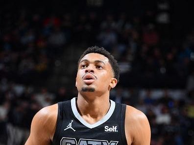 SAN ANTONIO, TX - DECEMBER 26: Keldon Johnson #3 of the San Antonio Spurs shoots a free throw during the game against the Utah Jazz on December 26, 2023 at the Frost Bank Center in San Antonio, Texas. NOTE TO USER: User expressly acknowledges and agrees that, by downloading and or using this photograph, user is consenting to the terms and conditions of the Getty Images License Agreement. Mandatory Copyright Notice: Copyright 2023 NBAE (Photos by Michael Gonzales/NBAE via Getty Images)