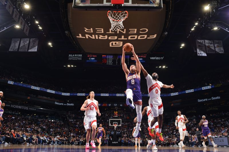 PHOENIX, AZ - MARCH 7: Grayson Allen #8 of the Phoenix Suns drives to the basket during the game against the Toronto Raptors on March 7, 2024 at Footprint Center in Phoenix, Arizona. NOTE TO USER: User expressly acknowledges and agrees that, by downloading and or using this photograph, user is consenting to the terms and conditions of the Getty Images License Agreement. Mandatory Copyright Notice: Copyright 2024 NBAE (Photo by Barry Gossage/NBAE via Getty Images)