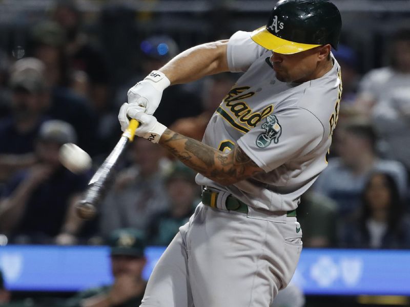 Jun 6, 2023; Pittsburgh, Pennsylvania, USA; Oakland Athletics second baseman Jace Peterson (6) hits a two run home run against the Pittsburgh Pirates during the eighth inning at PNC Park. Mandatory Credit: Charles LeClaire-USA TODAY Sports