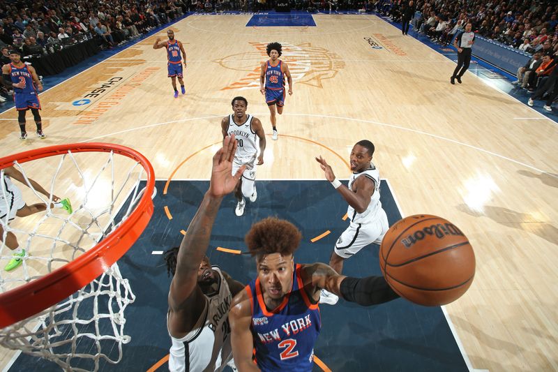 NEW YORK, NY - MARCH 23: Miles McBride #2 of the New York Knicks drives to the basket during the game against the Brooklyn Nets on March 23, 2024 at Madison Square Garden in New York City, New York.  NOTE TO USER: User expressly acknowledges and agrees that, by downloading and or using this photograph, User is consenting to the terms and conditions of the Getty Images License Agreement. Mandatory Copyright Notice: Copyright 2024 NBAE  (Photo by Nathaniel S. Butler/NBAE via Getty Images)