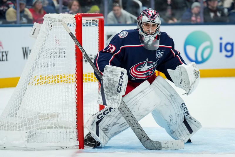 Nov 1, 2025; Columbus, Ohio, USA;  Columbus Blue Jackets goaltender Jet Greaves (73) defends the net against the St. Louis Blues in the third period at Nationwide Arena. Mandatory Credit: Aaron Doster-Imagn Images