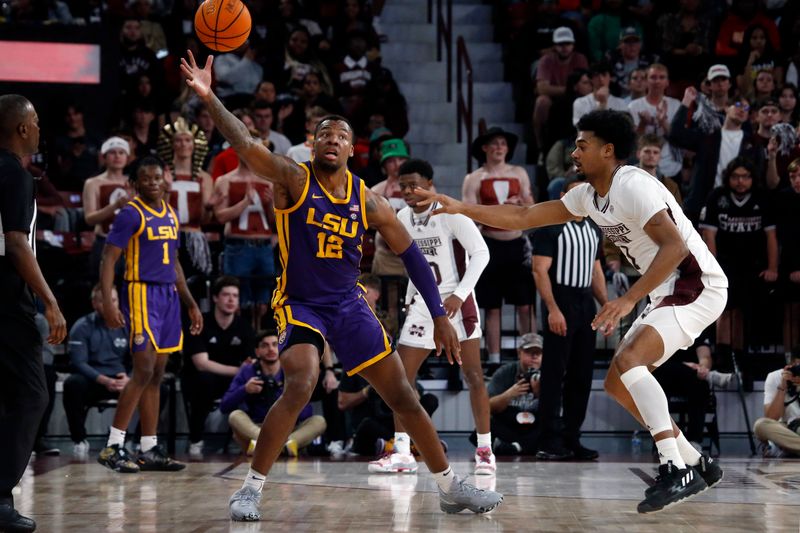 Feb 8, 2023; Starkville, Mississippi, USA; LSU Tigers forward KJ Williams (12) catches a pass as Mississippi State Bulldogs forward Tolu Smith (1) defends during the first half at Humphrey Coliseum. Mandatory Credit: Petre Thomas-USA TODAY Sports