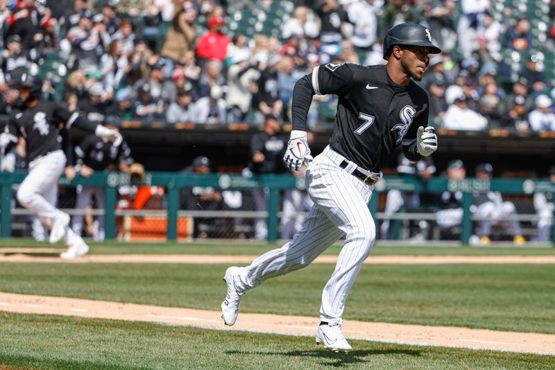 Apr 6, 2023; Chicago, Illinois, USA; Chicago White Sox shortstop Tim Anderson (7) runs to first base after hitting a two-run single against the San Francisco Giants during the second inning at Guaranteed Rate Field. Mandatory Credit: Kamil Krzaczynski-USA TODAY Sports