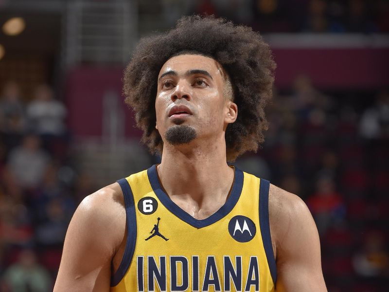 CLEVELAND, OH - APRIL 2:  Jordan Nwora #13 of the Indiana Pacers shoots a free throw during the game on April 2, 2023 at Rocket Mortgage FieldHouse in Cleveland, Ohio. NOTE TO USER: User expressly acknowledges and agrees that, by downloading and/or using this Photograph, user is consenting to the terms and conditions of the Getty Images License Agreement. Mandatory Copyright Notice: Copyright 2023 NBAE (Photo by David Liam Kyle/NBAE via Getty Images)