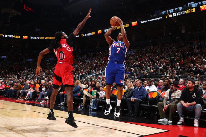 TORONTO, CANADA - MARCH 31: Kyle Lowry #7 of the Philadelphia 76ers shoots a three point basket against the Toronto Raptors on March 31, 2024 at the Scotiabank Arena in Toronto, Ontario, Canada.  NOTE TO USER: User expressly acknowledges and agrees that, by downloading and or using this Photograph, user is consenting to the terms and conditions of the Getty Images License Agreement.  Mandatory Copyright Notice: Copyright 2024 NBAE (Photo by Vaughn Ridley/NBAE via Getty Images)