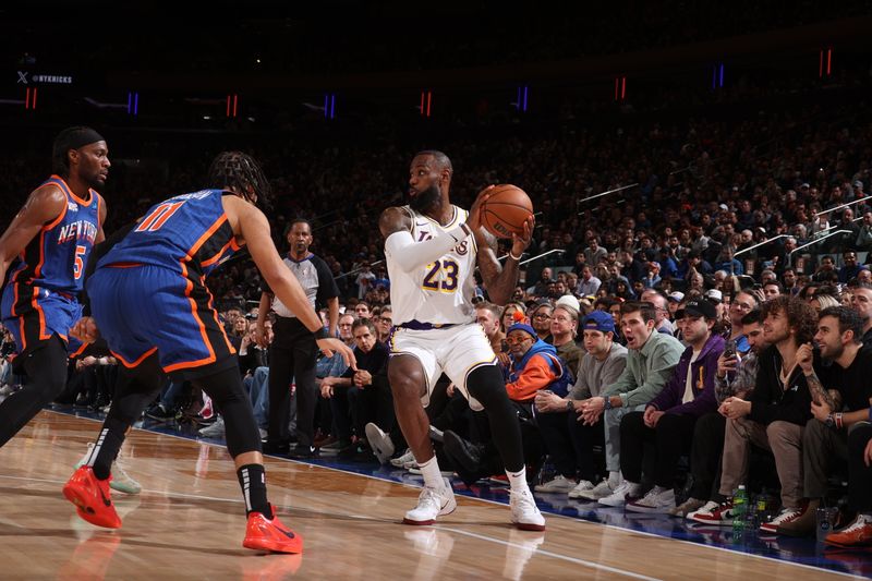 NEW YORK, NY - FEBRUARY 3: LeBron James #23 of the Los Angeles Lakers handles the ball during the game against the New York Knicks on February 3, 2024 at Madison Square Garden in New York City, New York.  NOTE TO USER: User expressly acknowledges and agrees that, by downloading and or using this photograph, User is consenting to the terms and conditions of the Getty Images License Agreement. Mandatory Copyright Notice: Copyright 2024 NBAE  (Photo by Nathaniel S. Butler/NBAE via Getty Images)