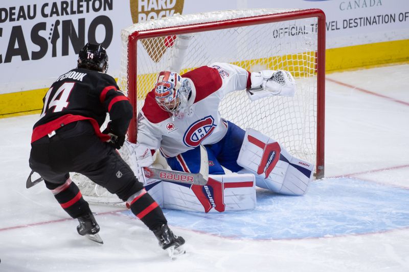 Apr 13, 2024; Ottawa, Ontario, CAN; Montreal Canadiens goalie Cayden Primeau (30) makes a save on a shot from Ottawa Senators left wing Boris Katchouk (14) in the third period at the Canadian Tire Centre. Mandatory Credit: Marc DesRosiers-USA TODAY Sports