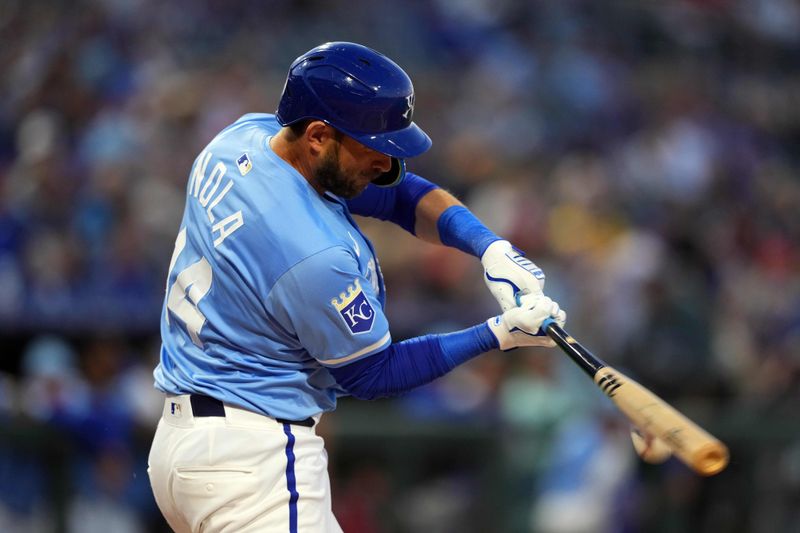 Mar 5, 2024; Surprise, Arizona, USA; Kansas City Royals catcher Austin Nola (14) bats against the Chicago Cubs during the second inning at Surprise Stadium. Mandatory Credit: Joe Camporeale-USA TODAY Sports