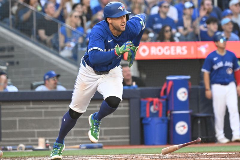 Sep 28, 2025; Toronto, Ontario, CAN;  Toronto Blue Jays designated hitter George Springer (4) hits a single against the Tampa Bay Rays in the fourth inning at Rogers Centre. Mandatory Credit: Dan Hamilton-Imagn Images