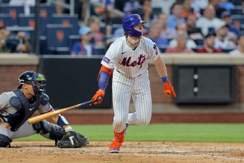 Jun 24, 2025; New York City, New York, USA; New York Mets third baseman Brett Baty (7) follows through on a two run single against the Atlanta Braves during the fourth inning at Citi Field. Mandatory Credit: Brad Penner-Imagn Images