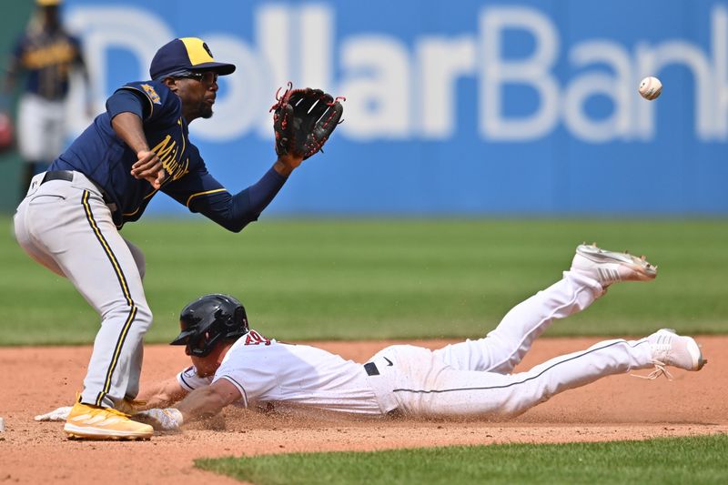 Jun 25, 2023; Cleveland, Ohio, USA; Cleveland Guardians center fielder Myles Straw (7) tries to steal second base as Milwaukee Brewers second baseman Andruw Monasterio (14) waits for the throw during the eighth inning at Progressive Field. Straw was out. Mandatory Credit: Ken Blaze-USA TODAY Sports