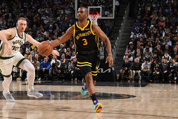 SAN FRANCISCO, CA - DECEMBER 19: Chris Paul #3 of the Golden State Warriors handles the ball during the game against the Boston Celtics on December 19, 2023 at Chase Center in San Francisco, California. NOTE TO USER: User expressly acknowledges and agrees that, by downloading and or using this photograph, user is consenting to the terms and conditions of Getty Images License Agreement. Mandatory Copyright Notice: Copyright 2023 NBAE (Photo by Noah Graham/NBAE via Getty Images)