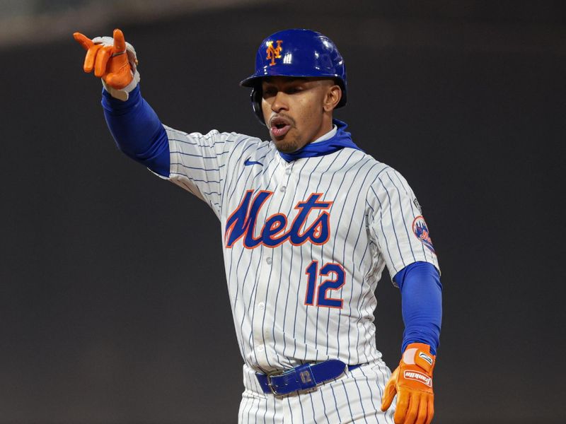 Apr 26, 2024; New York City, New York, USA; New York Mets shortstop Francisco Lindor (12) reacts after a double during the sixth inning against the St. Louis Cardinals at Citi Field. Mandatory Credit: Vincent Carchietta-USA TODAY Sports