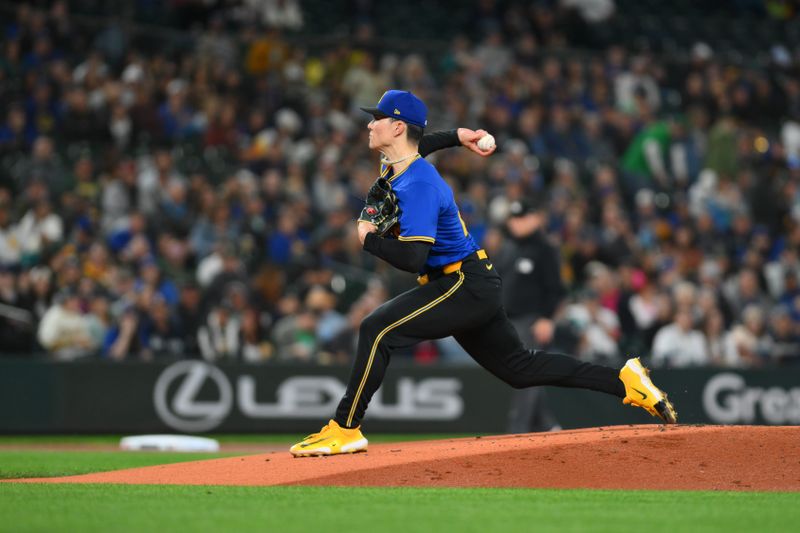 Sep 27, 2024; Seattle, Washington, USA;  Seattle Mariners starting pitcher Bryan Woo (22) pitches to the Oakland Athletics during the first inning at T-Mobile Park. Mandatory Credit: Steven Bisig-Imagn Images