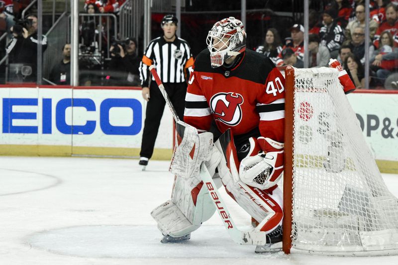 Feb 25, 2024; Newark, New Jersey, USA; \d40\ tends net against the Tampa Bay Lightning during the third period at Prudential Center. Mandatory Credit: John Jones-USA TODAY Sports