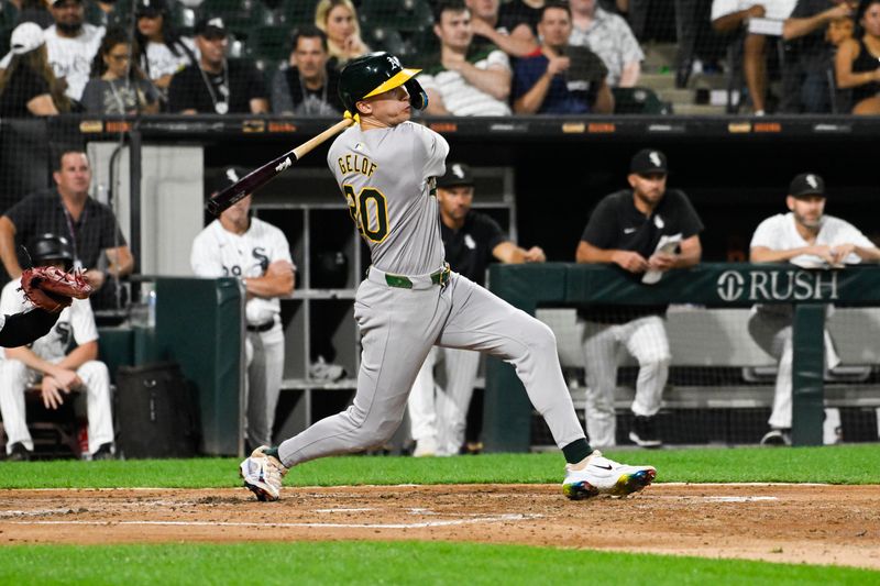 Sep 13, 2024; Chicago, Illinois, USA;  Oakland Athletics second base Zack Gelof (20) hits an RBI double against the Chicago White Sox during the fourth inning at Guaranteed Rate Field. Mandatory Credit: Matt Marton-Imagn Images