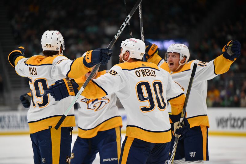 Mar 16, 2024; Seattle, Washington, USA; The Nashville Predators celebrate after defenseman Roman Josi (59) scored a goal against the Seattle Kraken during the third period at Climate Pledge Arena. Mandatory Credit: Steven Bisig-USA TODAY Sports