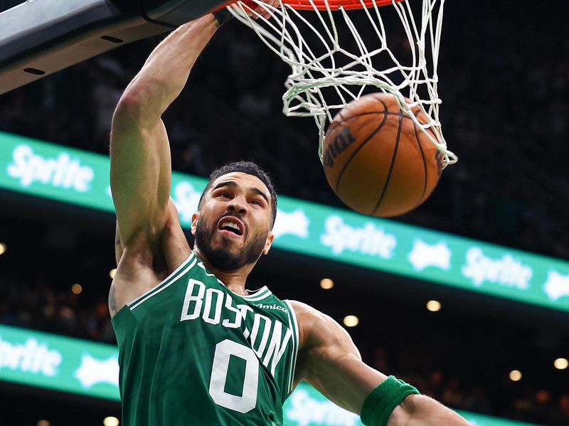 BOSTON, MASSACHUSETTS - MAY 07:  Jayson Tatum #0 of the Boston Celtics dunks the ball against the New York Knicks with 18 seconds remaining during the fourth quarter in Game Two of the Eastern Conference Second Round NBA Playoffs at TD Garden on May 07, 2025 in Boston, Massachusetts. NOTE TO USER: User expressly acknowledges and agrees that, by downloading and or using this photograph, User is consenting to the terms and conditions of the Getty Images License Agreement. (Photo by Maddie Meyer/Getty Images)