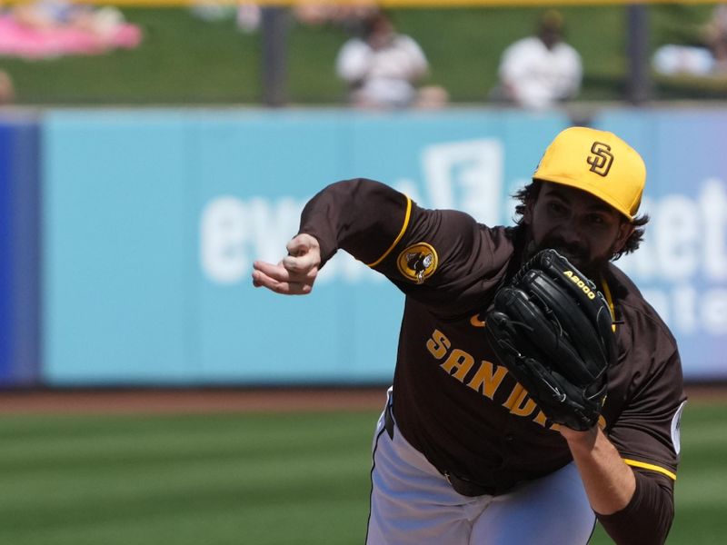 Mar 22, 2025; Peoria, Arizona, USA; San Diego Padres pitcher Dylan Cease (84) throws against the Cincinnati Reds in the first inning at Peoria Sports Complex. Mandatory Credit: Rick Scuteri-Imagn Images