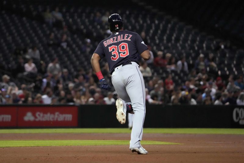 Mar 27, 2023; Phoenix, Arizona, USA; Cleveland Guardians right fielder Oscar Gonzalez (39) runs to second base en route to a double against the Arizona Diamondbacks during the second inning at Chase Field. Mandatory Credit: Joe Camporeale-USA TODAY Sports