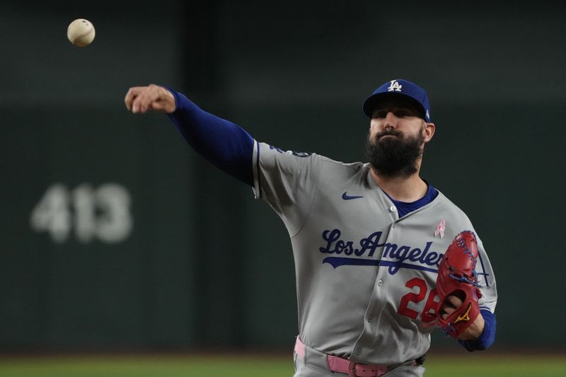 May 11, 2025; Phoenix, Arizona, USA; Los Angeles Dodgers pitcher Tony Gonsolin (26) throws against the Arizona Diamondbacks in the first inning at Chase Field. Mandatory Credit: Rick Scuteri-Imagn Images