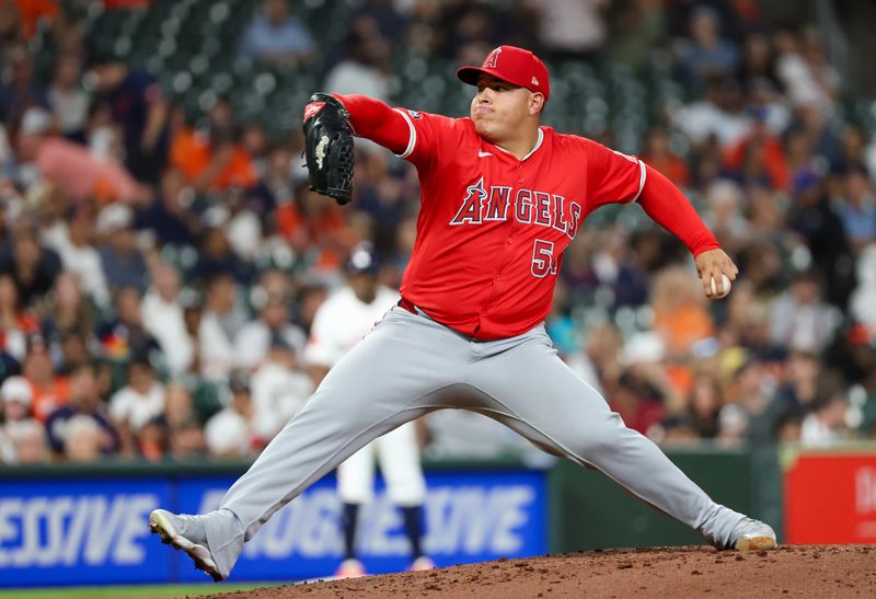 Sep 19, 2024; Houston, Texas, USA;   Los Angeles Angels starting pitcher Jose Suarez (54) pitches against the Houston Astros in the second inning at Minute Maid Park. Mandatory Credit: Thomas Shea-Imagn Images