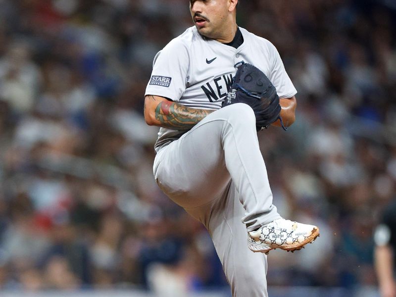 Jul 11, 2024; St. Petersburg, Florida, USA; New York Yankees pitcher Nestor Cortes (65) throws a pitch against the Tampa Bay Rays in the third inning  at Tropicana Field. Mandatory Credit: Nathan Ray Seebeck-USA TODAY Sports