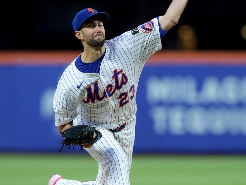 May 12, 2025; New York City, New York, USA; New York Mets starting pitcher David Peterson (23) pitches against the Pittsburgh Pirates during the third inning at Citi Field. Mandatory Credit: Brad Penner-Imagn Images