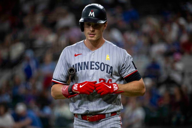 Sep 3, 2023; Arlington, Texas, USA; Minnesota Twins right fielder Max Kepler (26) walks back to the dugout after striking out against the Texas Rangers during the fourth inning at Globe Life Field. Mandatory Credit: Jerome Miron-USA TODAY Sports