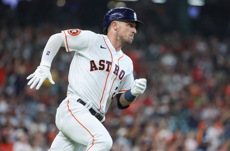 Aug 12, 2023; Houston, Texas, USA; Houston Astros third baseman Alex Bregman (2) runs to first base on a double during the fourth inning against the Los Angeles Angels at Minute Maid Park. Mandatory Credit: Troy Taormina-USA TODAY Sports