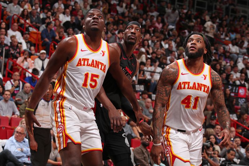 MIAMI, FL - JANUARY 19: Clint Capela #15 and Saddiq Bey #41 of the Atlanta Hawks wait for a rebound during the game against the Miami Heat on January 19, 2024 at Kaseya Center in Miami, Florida. NOTE TO USER: User expressly acknowledges and agrees that, by downloading and or using this Photograph, user is consenting to the terms and conditions of the Getty Images License Agreement. Mandatory Copyright Notice: Copyright 2024 NBAE (Photo by Issac Baldizon/NBAE via Getty Images)