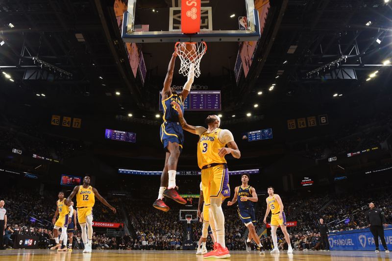 SAN FRANCISCO, CA - FEBRUARY 22:  Jonathan Kuminga #00 of the Golden State Warriors goes to the basket during the game on February 22, 2024 at Chase Center in San Francisco, California. NOTE TO USER: User expressly acknowledges and agrees that, by downloading and or using this photograph, user is consenting to the terms and conditions of Getty Images License Agreement. Mandatory Copyright Notice: Copyright 2024 NBAE (Photo by Noah Graham/NBAE via Getty Images)