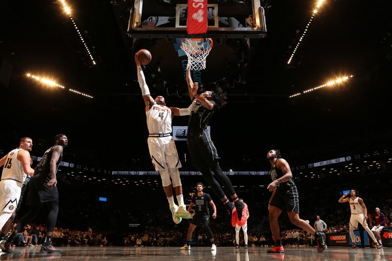 BROOKLYN, NY - OCTOBER 29: Russell Westbrook #4 of the Denver Nuggets drives to the basket during the game against the Brooklyn Nets on October 29, 2024 at Barclays Center in Brooklyn, New York. NOTE TO USER: User expressly acknowledges and agrees that, by downloading and or using this Photograph, user is consenting to the terms and conditions of the Getty Images License Agreement. Mandatory Copyright Notice: Copyright 2024 NBAE (Photo by Nathaniel S. Butler/NBAE via Getty Images)