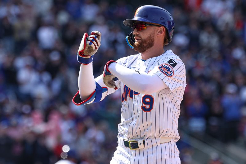 Apr 20, 2025; New York City, New York, USA; New York Mets left fielder Brandon Nimmo (9) reacts after hitting an RBI single during the seventh inning against the St. Louis Cardinals at Citi Field. Mandatory Credit: Vincent Carchietta-Imagn Images