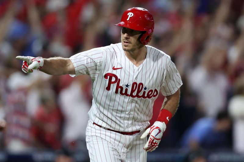 Oct 4, 2023; Philadelphia, Pennsylvania, USA; Philadelphia Phillies catcher J.T. Realmuto (10) reacts after hitting a solo home run against the Miami Marlins during the fourth inning for game two of the Wildcard series for the 2023 MLB playoffs at Citizens Bank Park. Mandatory Credit: Bill Streicher-USA TODAY Sports