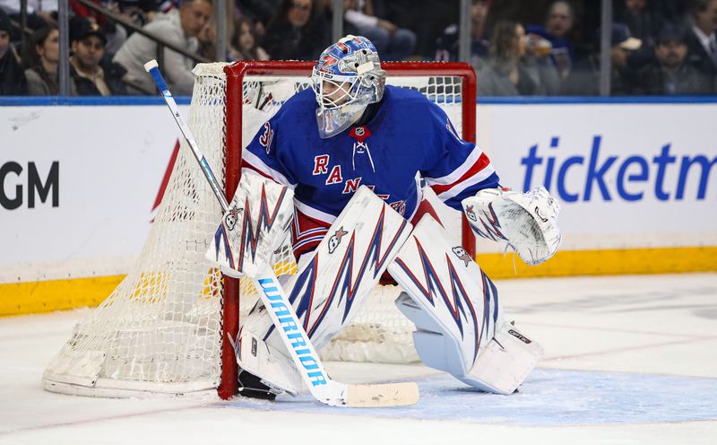 Jan 18, 2025; New York, New York, USA; New York Rangers goalie Igor Shesterkin (31) protects the net against the Columbus Blue Jackets during the second period at Madison Square Garden. Mandatory Credit: Danny Wild-Imagn Images