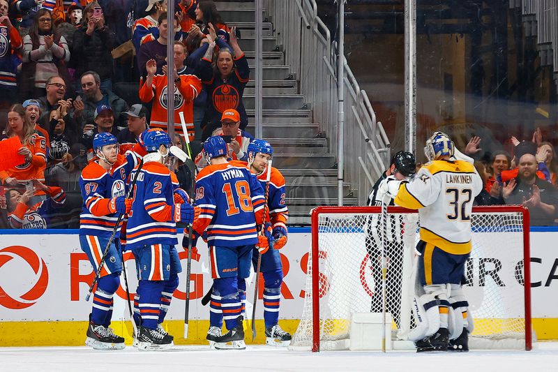 Jan 27, 2024; Edmonton, Alberta, CAN; The Edmonton Oilers celebrate a goal scored by forward Leon Draisaitl (29) during the second period against the Nashville Predators at Rogers Place. Mandatory Credit: Perry Nelson-USA TODAY Sports