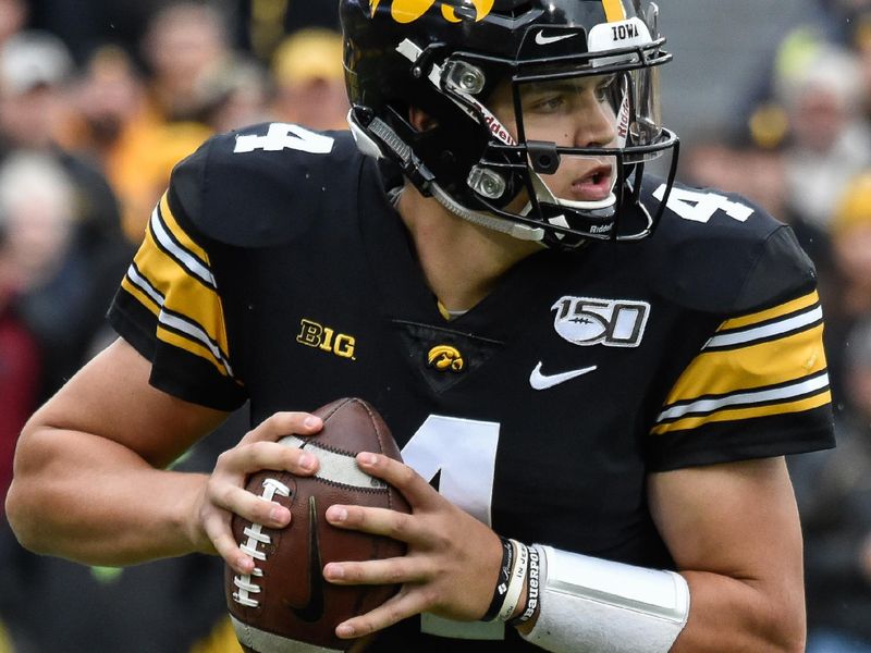 Oct 19, 2019; Iowa City, IA, USA; Iowa Hawkeyes quarterback Nate Stanley (4) drops back to throw a pass against the Purdue Boilermakers during the first quarter at Kinnick Stadium. Mandatory Credit: Jeffrey Becker-USA TODAY Sports