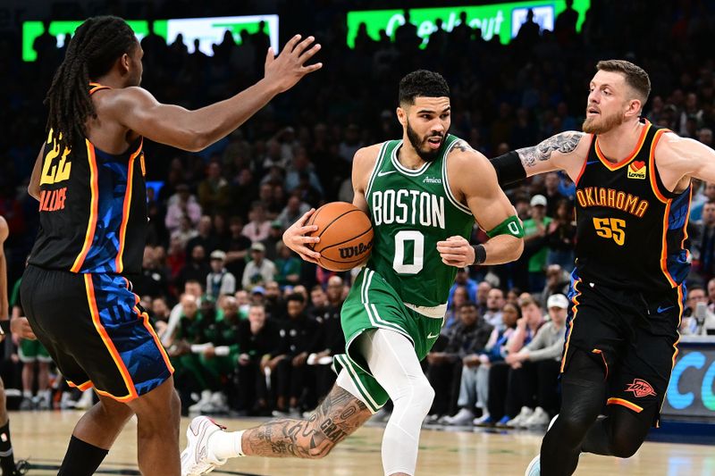 OKLAHOMA CITY, OKLAHOMA - JANUARY 5: Jayson Tatum #0 of the Boston Celtics handles the ball during the second half against the Oklahoma City Thunder at Paycom Center on January 5, 2025 in Oklahoma City, Oklahoma. NOTE TO USER: User expressly acknowledges and agrees that, by downloading and or using this photograph, User is consenting to the terms and conditions of the Getty Images License Agreement. (Photo by Joshua Gateley/Getty Images)