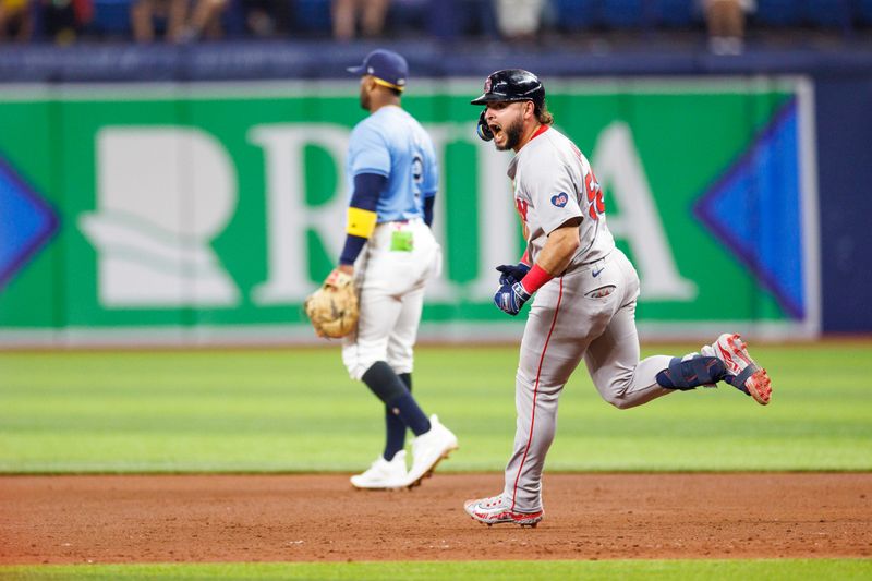 May 22, 2024; St. Petersburg, Florida, USA;  Boston Red Sox outfielder Wilyer Abreu (52) runs the bases after hitting a two run home run against the Tampa Bay Rays in the sixth inning at Tropicana Field. Mandatory Credit: Nathan Ray Seebeck-USA TODAY Sports