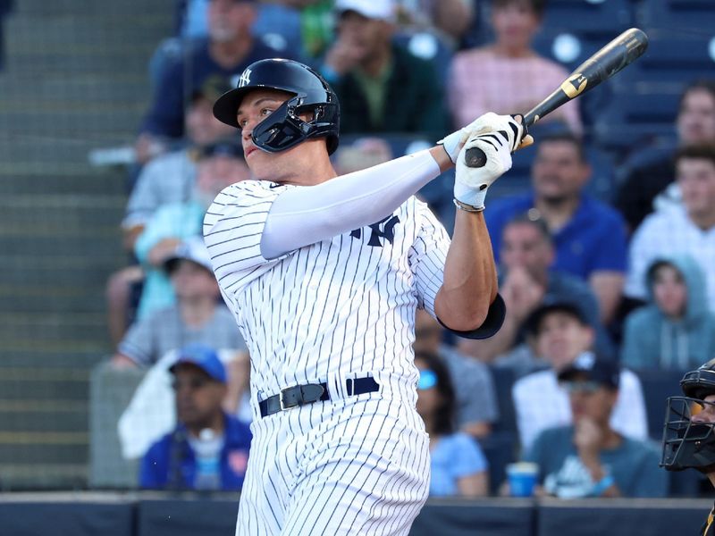 Mar 16, 2023; Tampa, Florida, USA; New York Yankees center fielder Aaron Judge (99) doubles against the Pittsburgh Pirates during the second inning at George M. Steinbrenner Field. Mandatory Credit: Kim Klement-USA TODAY Sports