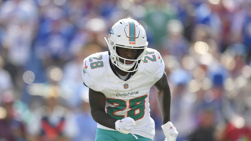 Miami Dolphins running back De'Von Achane runs on the field during the second half of an NFL football game against the Buffalo Bills, Sunday, Oct. 1, 2023, in Orchard Park, N.Y. (AP Photo/Adrian Kraus)