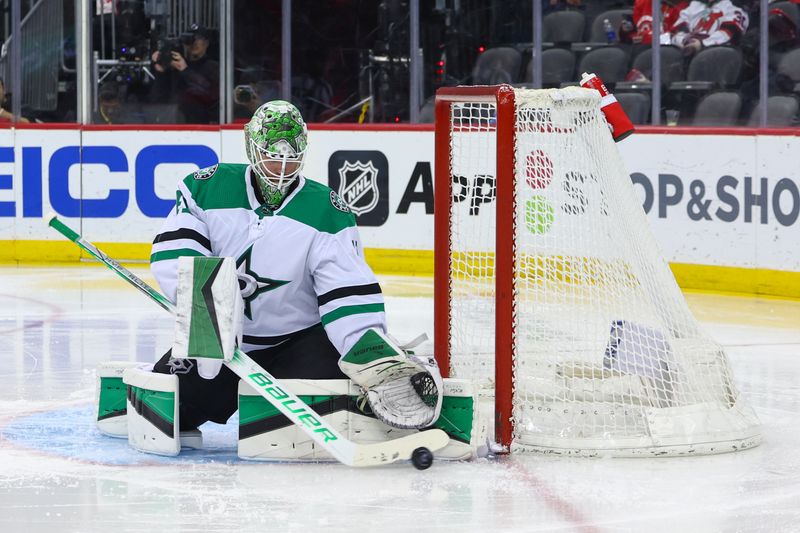 Jan 20, 2024; Newark, New Jersey, USA; Dallas Stars goaltender Scott Wedgewood (41) makes a save against the New Jersey Devils during the second period at Prudential Center. Mandatory Credit: Ed Mulholland-USA TODAY Sports