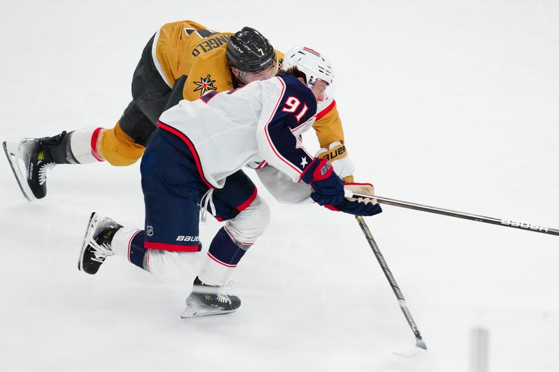 Jan 30, 2025; Las Vegas, Nevada, USA; Columbus Blue Jackets center Kent Johnson (91) skates past Vegas Golden Knights defenseman Alex Pietrangelo (7) during an overtime period at T-Mobile Arena. Mandatory Credit: Stephen R. Sylvanie-Imagn Images